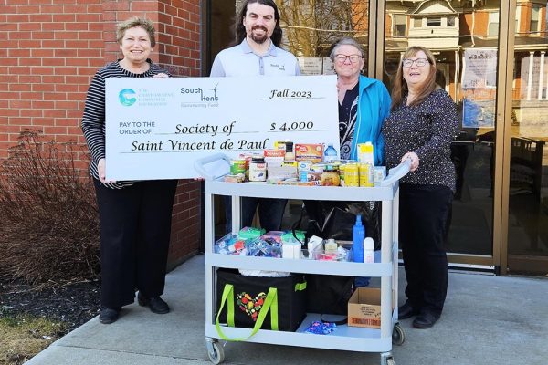 Photo, L to R: Kathryn Biondi, Vice Chair, Chatham Kent Community Foundation… Kevin Aikenhead, Facility Manager, South Kent Wind… Cindy Shepley, President, Society of Saint Vincent DePaul Wallaceburg… Kim VanDamme, Treasurer, Society of Saint Vincent DePaul Wallaceburg